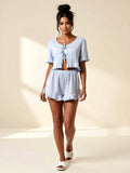 Zweiteiliges Set mit gebundenen Shorts