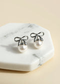 Shell Pearl Bow Stud Earrings in Platinum-Plated .925 Sterling Silver