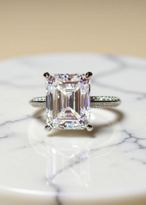 5 Carat Emerald-Cut Moissanite Solitaire Ring in Platinum-Plated .925 Sterling Silver