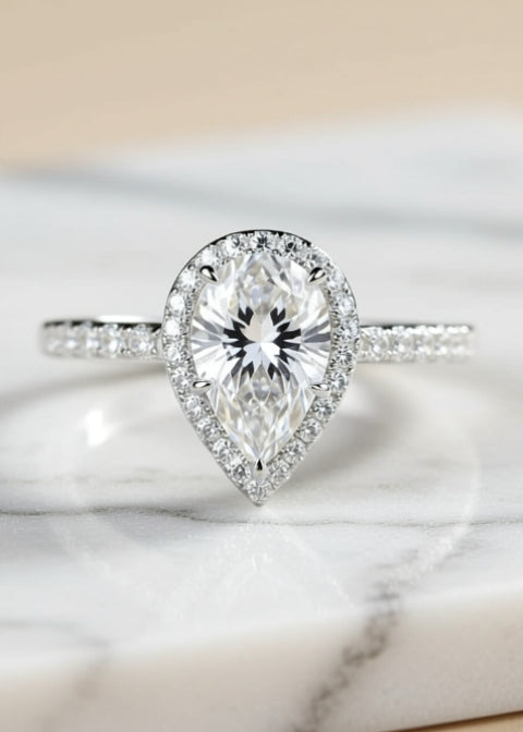 4 Carat Pear-Cut Moissanite Halo Ring in .925 Sterling Silver