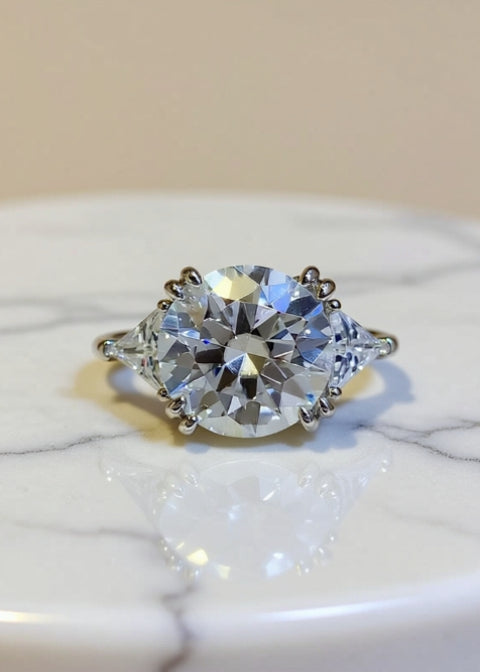 5 Carat Round Moissanite Three-Stone Ring in .925 Sterling Silver
