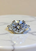 5 Carat Round Moissanite Three-Stone Ring in .925 Sterling Silver