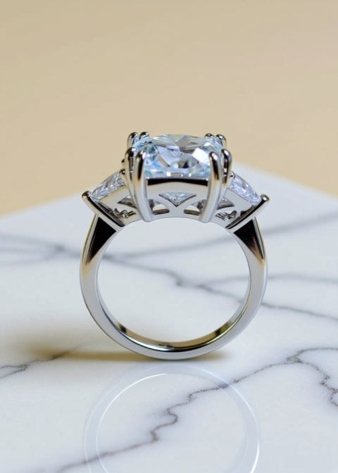 5 Carat Round Moissanite Three-Stone Ring in .925 Sterling Silver