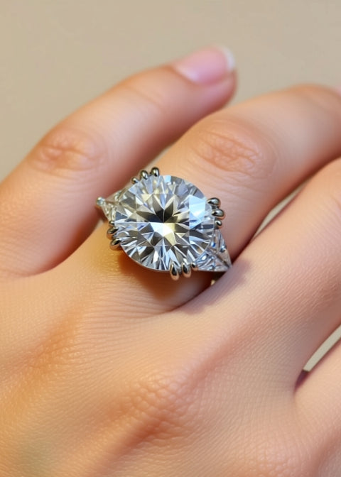 5 Carat Round Moissanite Three-Stone Ring in .925 Sterling Silver