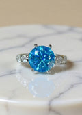 5 Carat Blue Round-Cut Moissanite Statement Ring in Platinum-Plated .925 Sterling Silver
