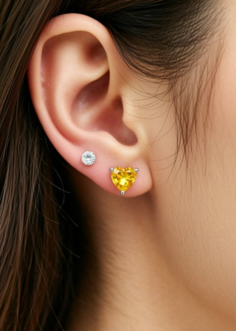 2CT Yellow Heart-Cut Moissanite Stud Earrings in Platinum-Plated .925 Sterling Silver