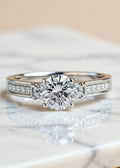 0.8 Carat Round Moissanite Three-Stone Ring in Sterling Silver