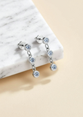 0.6 CT Moissanite Three-Stone Drop Earrings in Platinum-Plated Sterling Silver