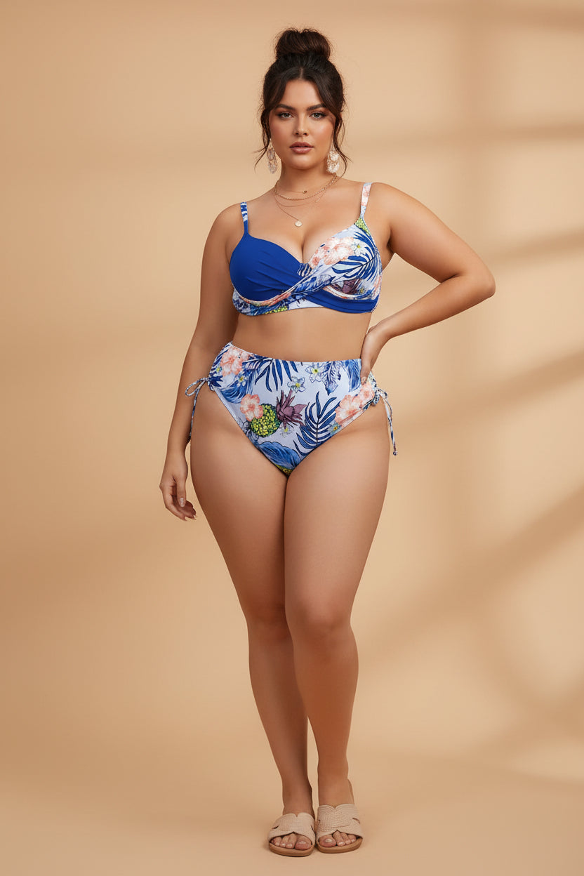 Woman wearing a blue and floral bikini set on a plain background