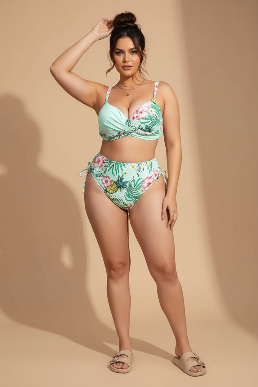 Woman wearing a tropical print bikini with a white background